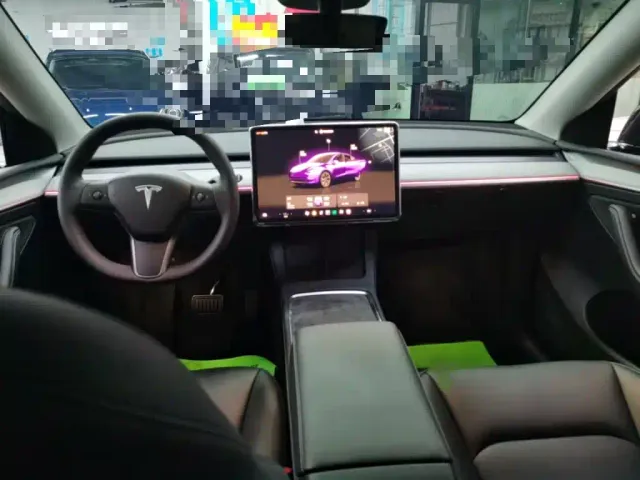 Tesla Model Y — Фото автомобиля 13