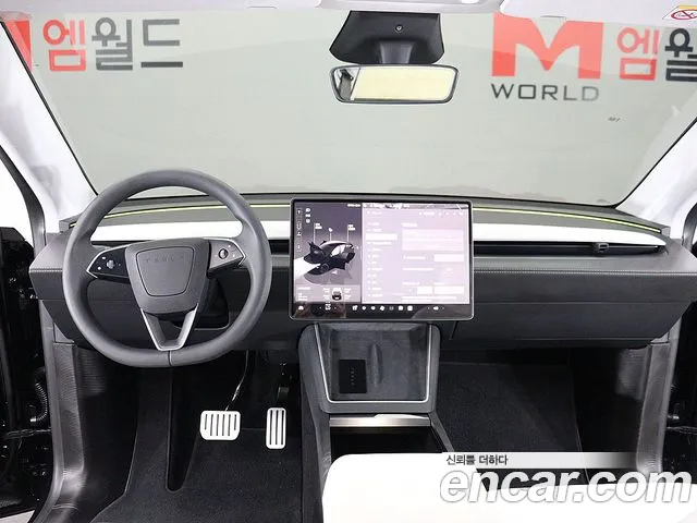 Tesla Model Y — Фото автомобиля 7