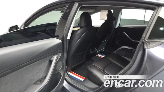 Tesla Model 3 — Фото автомобиля 16