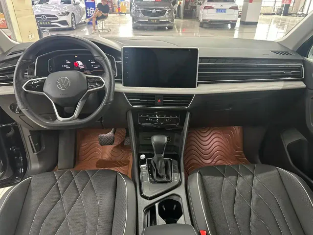 Volkswagen Tiguan L — Фото автомобиля 5