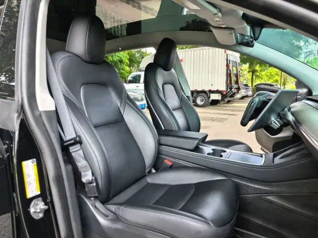 Tesla Model Y — Фото автомобиля 7