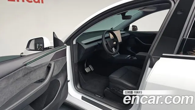 Tesla Model Y — Фото автомобиля 7