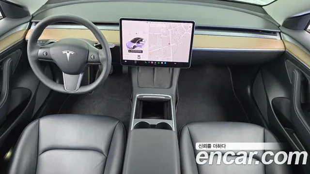 Tesla Model 3 — Фото автомобиля 10