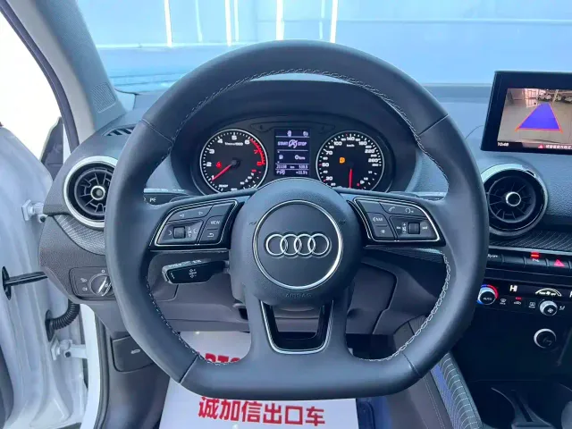 Audi Q2L — Фото автомобиля 11