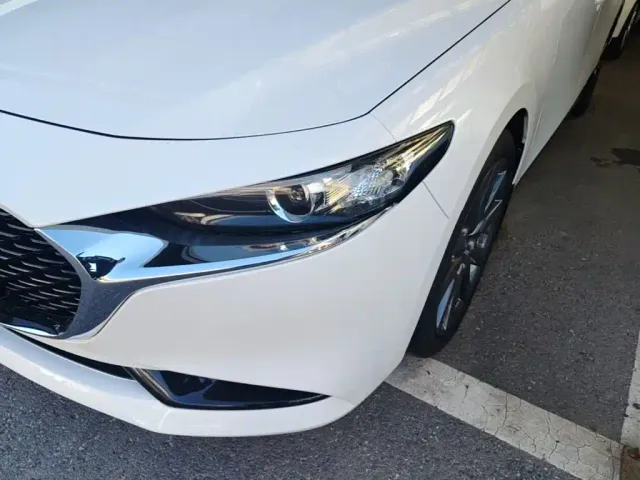 Mazda Axela — Фото автомобиля 23