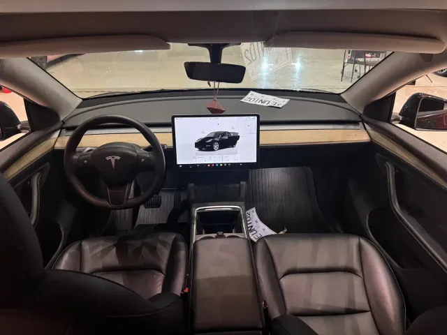 Tesla Model Y — Фото автомобиля 8