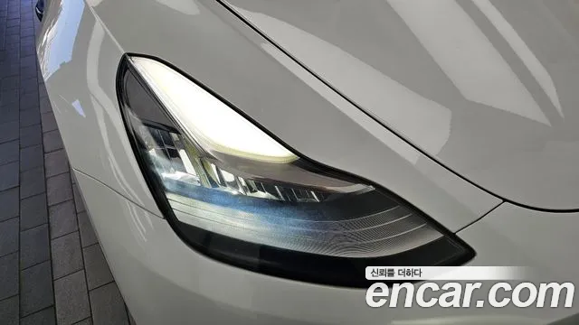 Tesla Model Y — Фото автомобиля 21