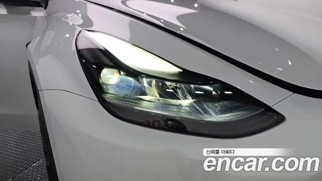 Tesla Model Y — Фото автомобиля 7