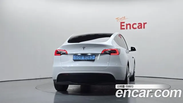 Tesla Model Y — Фото автомобиля 4