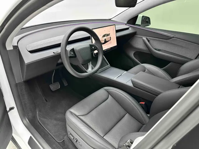 Tesla Model Y — Фото автомобиля 10