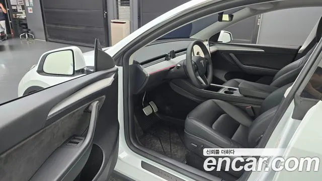 Tesla Model Y — Фото автомобиля 10