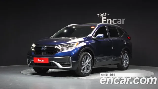 Фотография автомобиля — Honda CR-V CR-V 5-е поколение 2.0 гибрид Touring 4WD