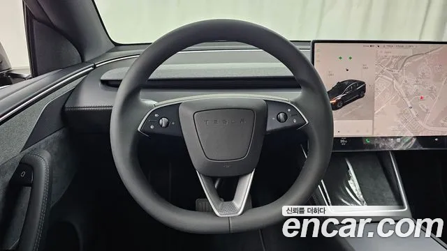 Tesla Model Y — Фото автомобиля 13
