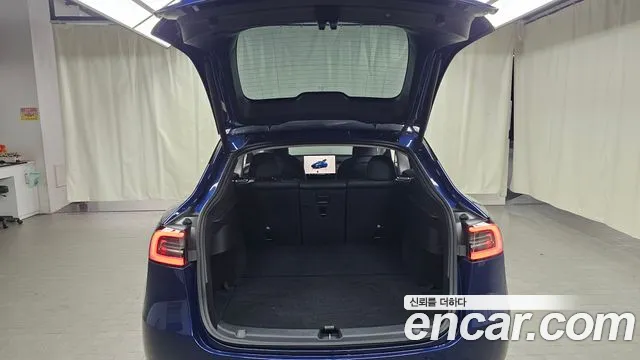 Tesla Model Y — Фото автомобиля 24
