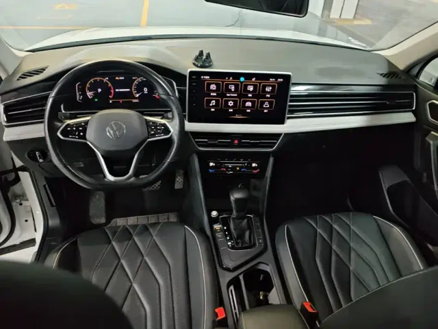 Volkswagen Tiguan L — Фото автомобиля 9