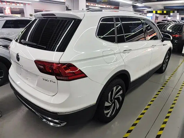 Volkswagen Tiguan L — Фото автомобиля 6