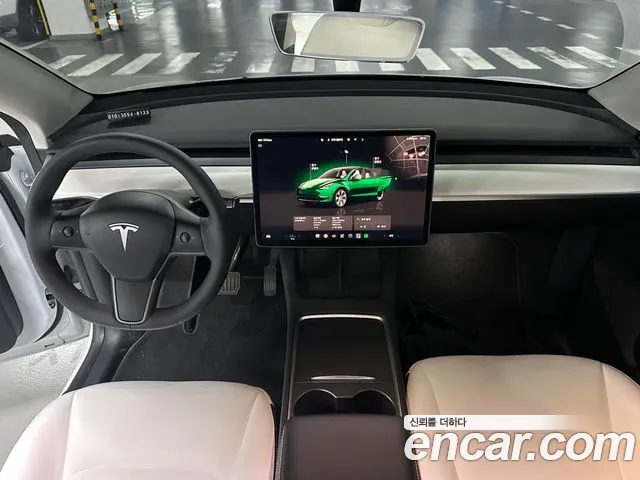 Tesla Model Y — Фото автомобиля 10