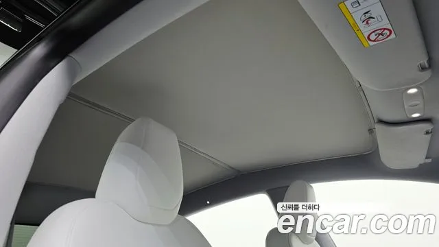 Tesla Model Y — Фото автомобиля 23