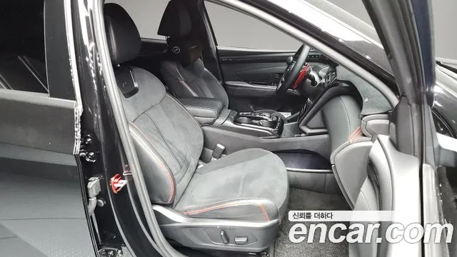 Hyundai Tucson Tucson (NX4) Бензин 1.6 турбо 2WD — Фото автомобиля 11