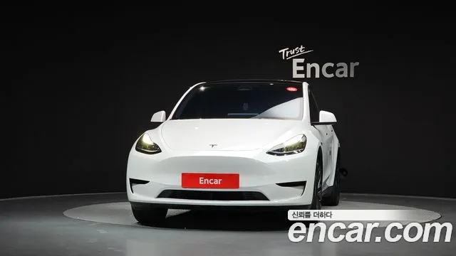 Tesla Model Y — Фото автомобиля 3