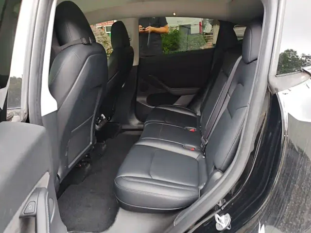 Tesla Model Y — Фото автомобиля 18