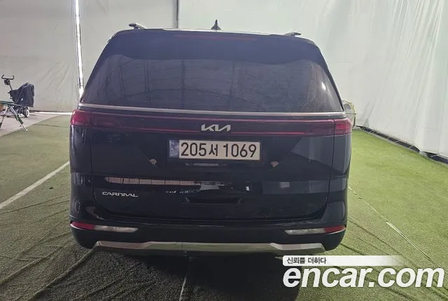 Kia Carnival Generation 4 — Фото автомобиля 4