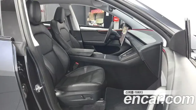 Tesla Model Y — Фото автомобиля 11