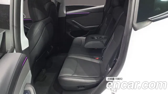 Tesla Model Y — Фото автомобиля 11