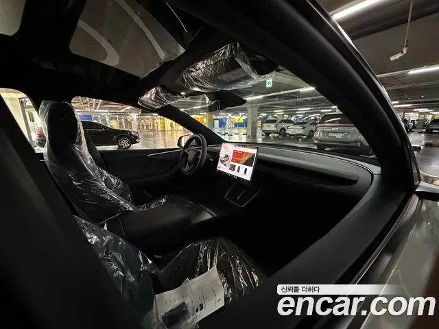 Tesla Model Y — Фото автомобиля 6