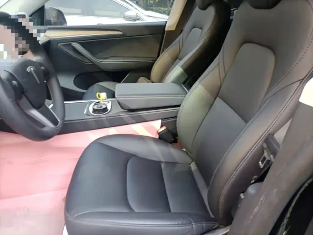 Tesla Model Y — Фото автомобиля 16