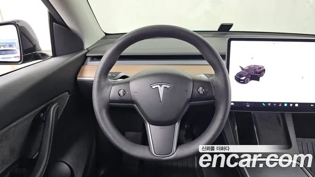 Tesla Model Y — Фото автомобиля 19