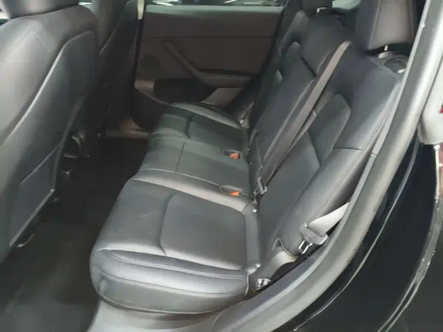 Tesla Model Y — Фото автомобиля 16