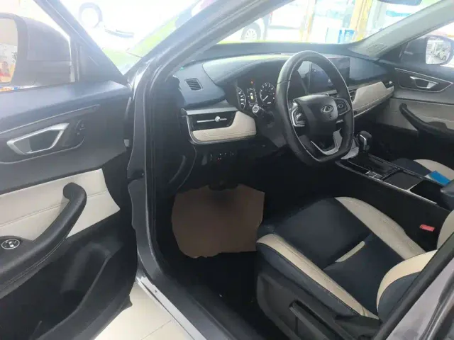 Chery Tiggo 5x — Фото автомобиля 11