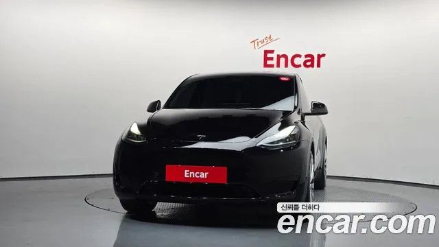 Tesla Model Y — Фото автомобиля 3