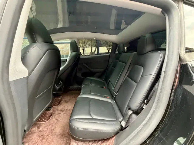 Tesla Model Y — Фото автомобиля 8