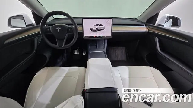 Tesla Model Y — Фото автомобиля 10
