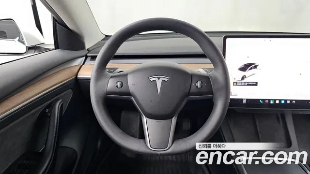 Tesla Model 3 — Фото автомобиля 11