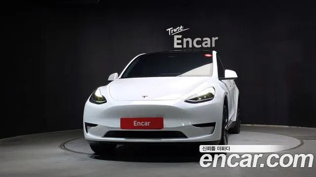 Tesla Model Y — Фото автомобиля 3