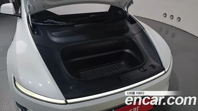 Tesla Model Y — Фото автомобиля 6