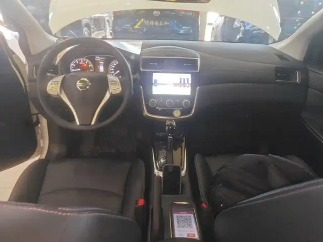 Nissan Tiida — Фото автомобиля 9