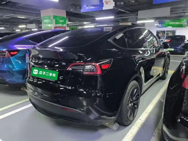 Tesla Model Y — Фото автомобиля 6