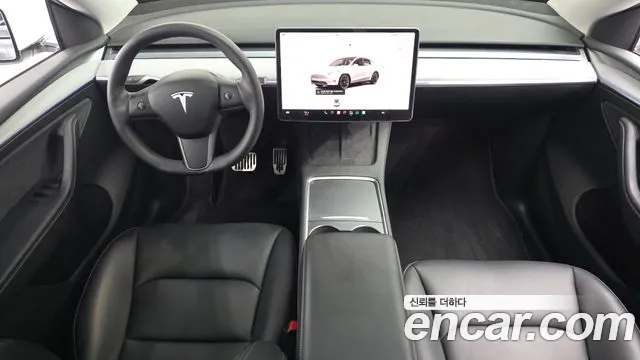 Tesla Model Y — Фото автомобиля 7