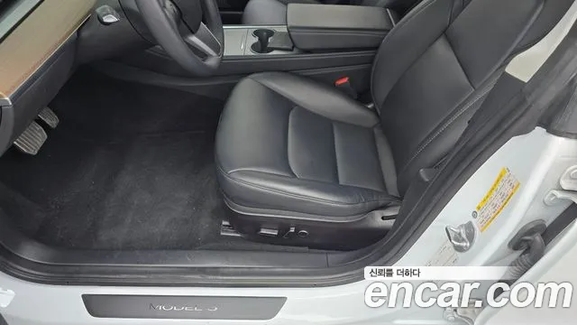 Tesla Model 3 — Фото автомобиля 26