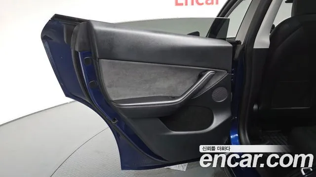 Tesla Model Y — Фото автомобиля 14