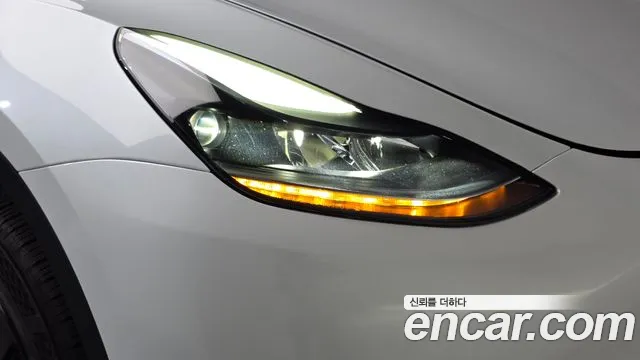 Tesla Model Y — Фото автомобиля 7