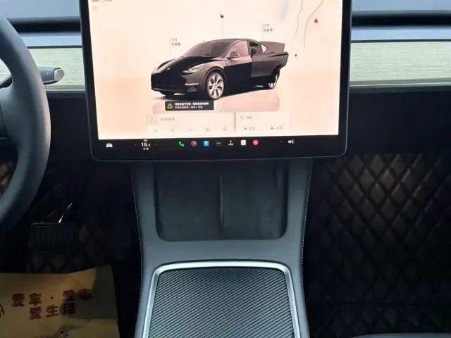Tesla Model Y — Фото автомобиля 15