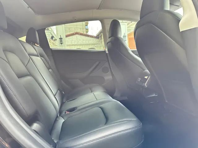 Tesla Model Y — Фото автомобиля 13