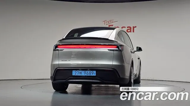 Tesla Model Y — Фото автомобиля 4