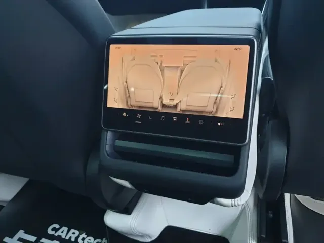 Tesla Model Y — Фото автомобиля 21