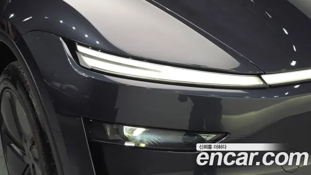 Tesla Model Y — Фото автомобиля 7